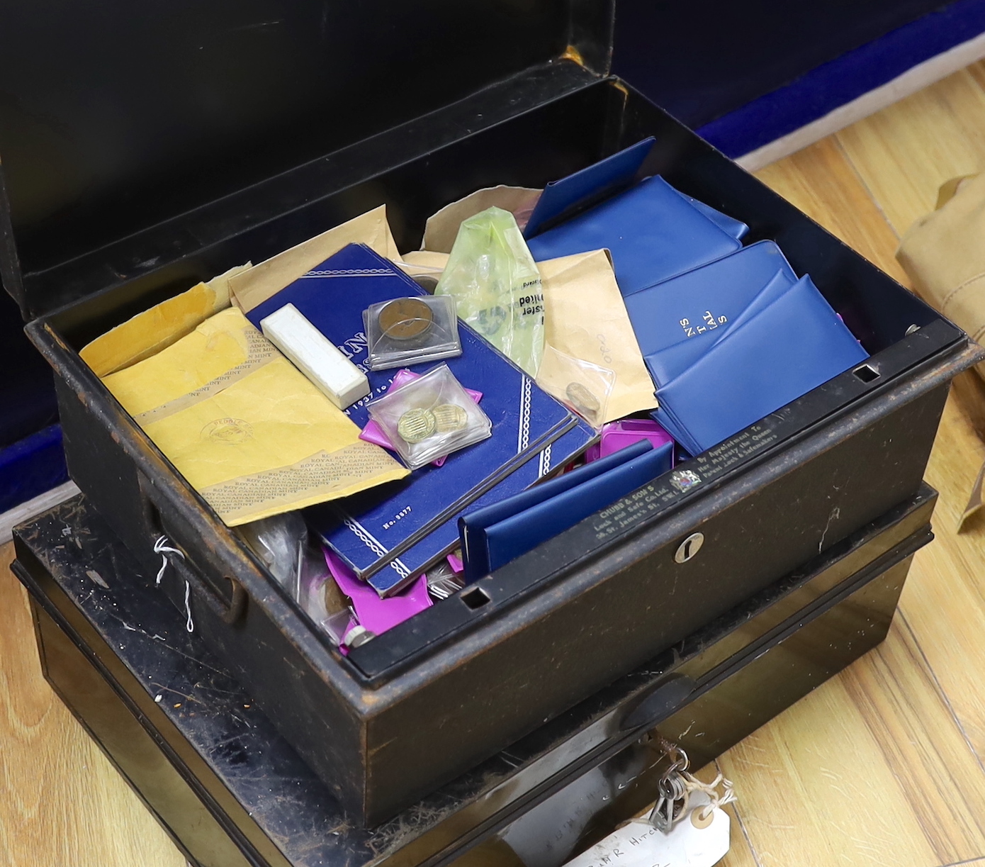 A large quantity of UK coins, mostly George V to Elizabeth II many UNC. in two metal boxes